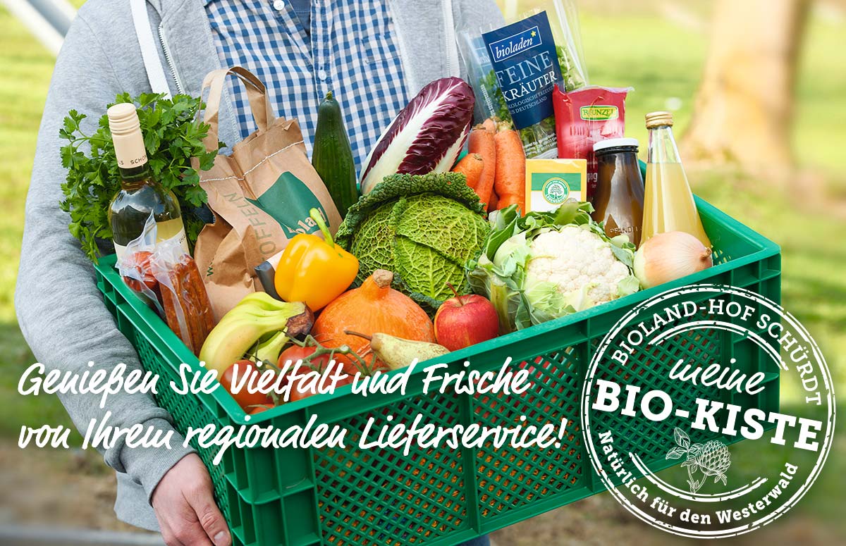 Foto einer mit Obst und Gemüse gefüllten Bio-Kiste und dem Logo Meine Biokiste